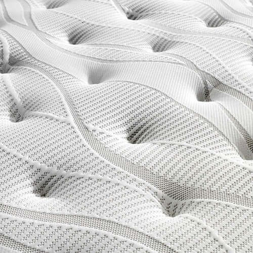 Close-up view of a Pocket Spring Mattress with Euro Top design, showcasing soft knitted fabric and textured surface.